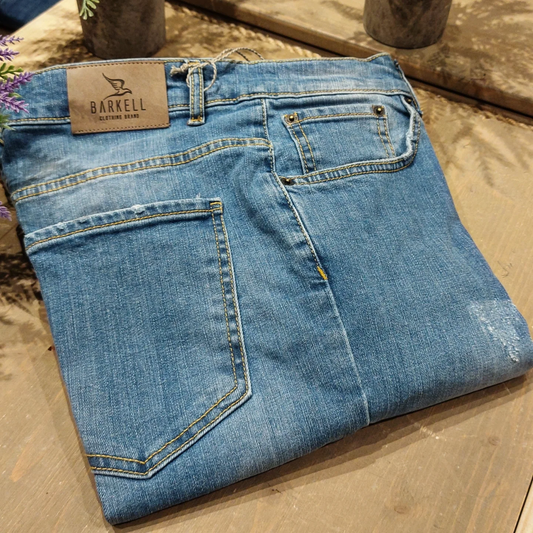 Jeans Modello Cinque Tasche Lavaggio Used Wash con Rinacci