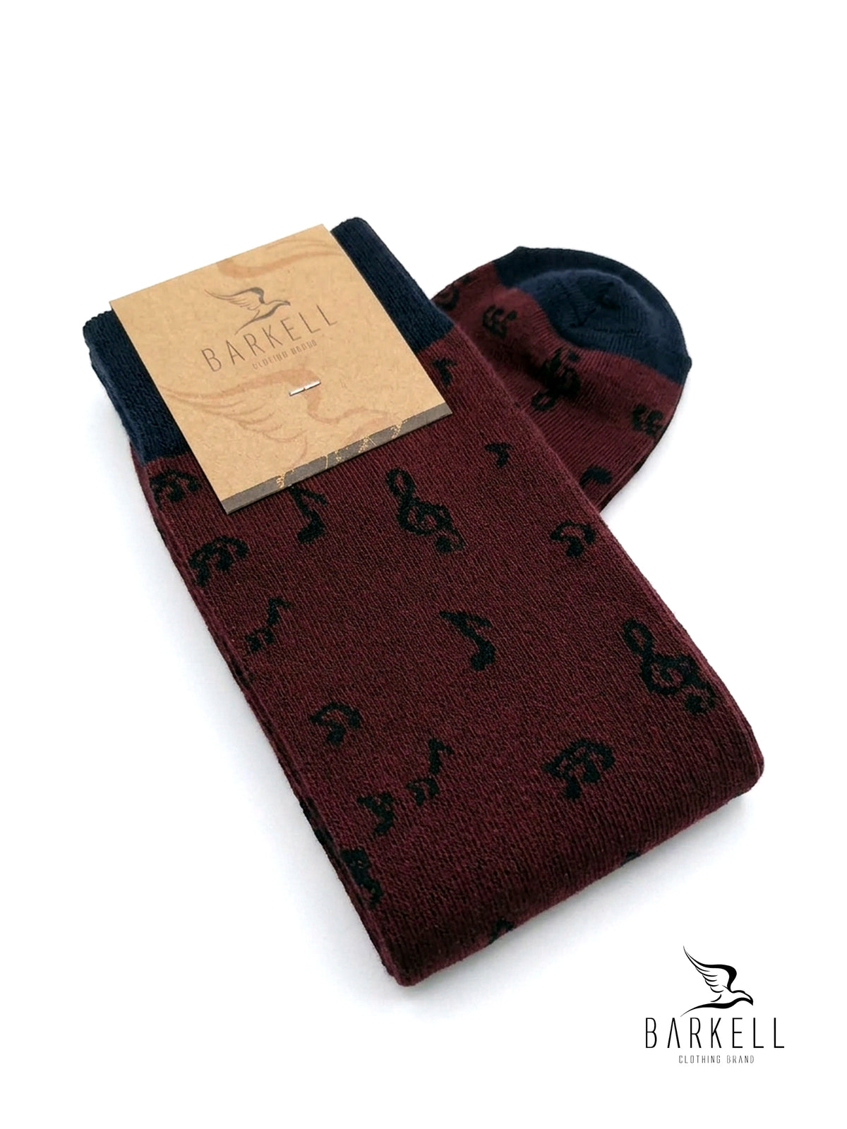 Long socks in warm, high quality cotton. Bordeaux background with musical notes pattern