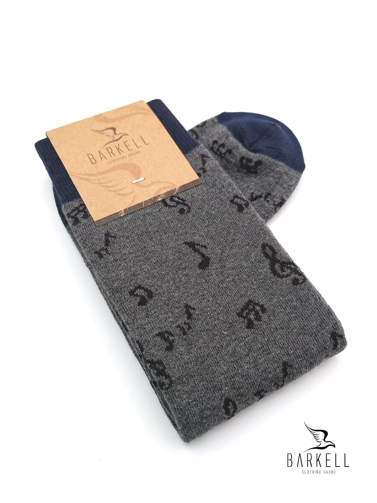 Long socks in warm high quality cotton. Gray background with musical notes pattern