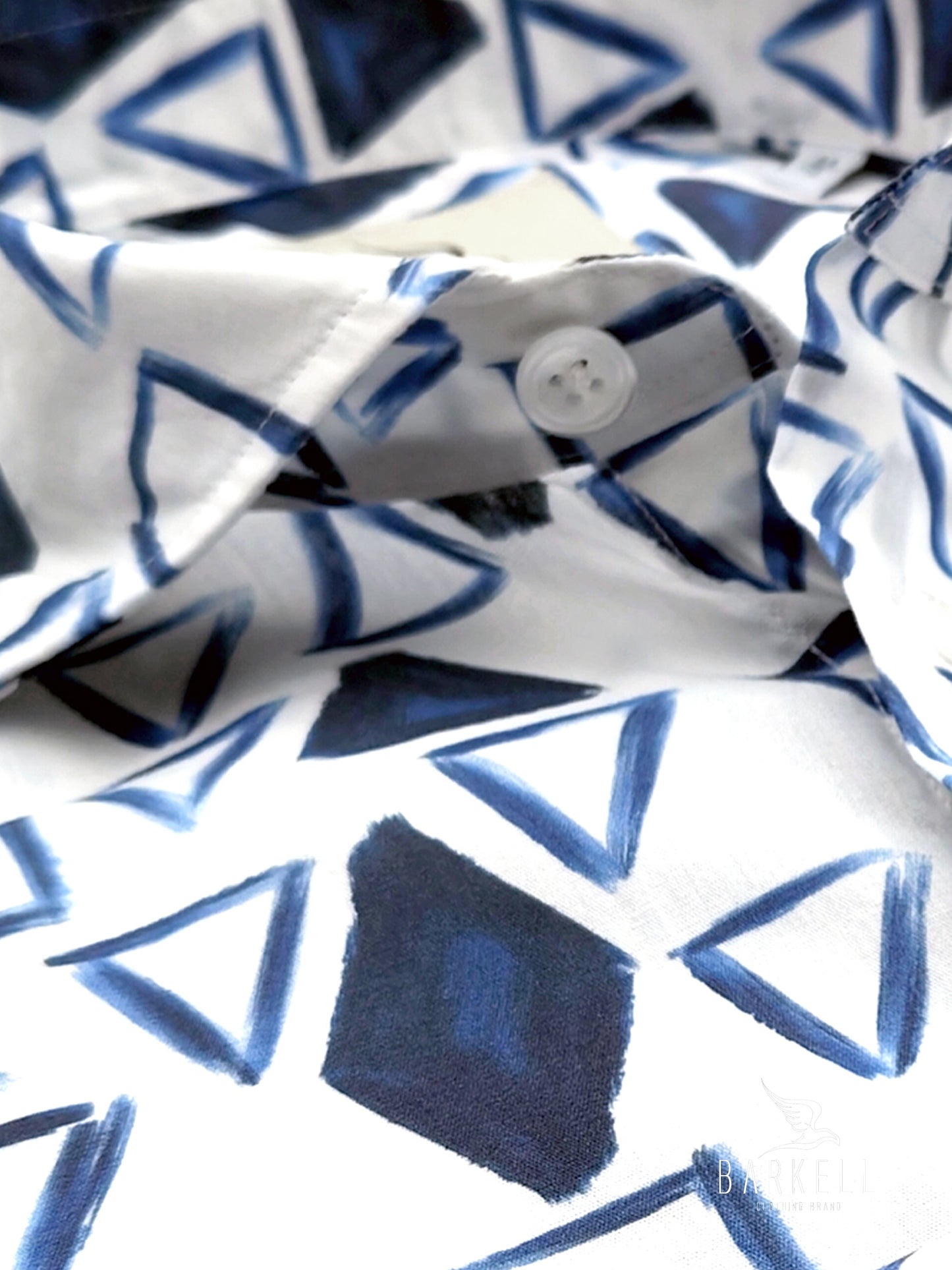 Cotton Shirt with Blue Triangle Pattern on White Background with Small Spread Collar