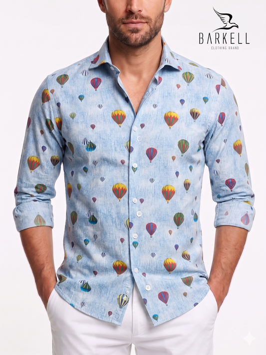 Cotton shirt with multicolored hot air balloon pattern. Light blue background. Small spread collar